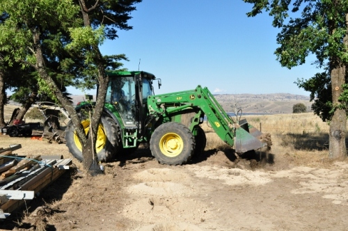 Digging a trench with the tractor